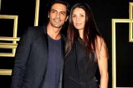 Arjun Rampal spotted with wife Mehr Jesia at a bank 